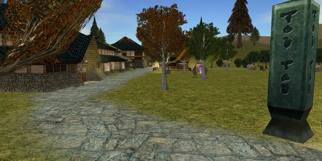 A Tou-Tou standing stone monument on the road into a Sho-style village in Daralet